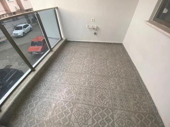 1+1-Wohnung Im Zentrum Von Ortaca Zu Verkaufen, 1. Stock Über Einem Geschäft