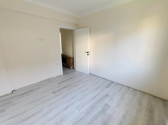 1+1-Apartment Zum Verkauf Im Stadtteil Cumhuriyet, 55 M², Mit Garten, Eingang Im Erdgeschoss.