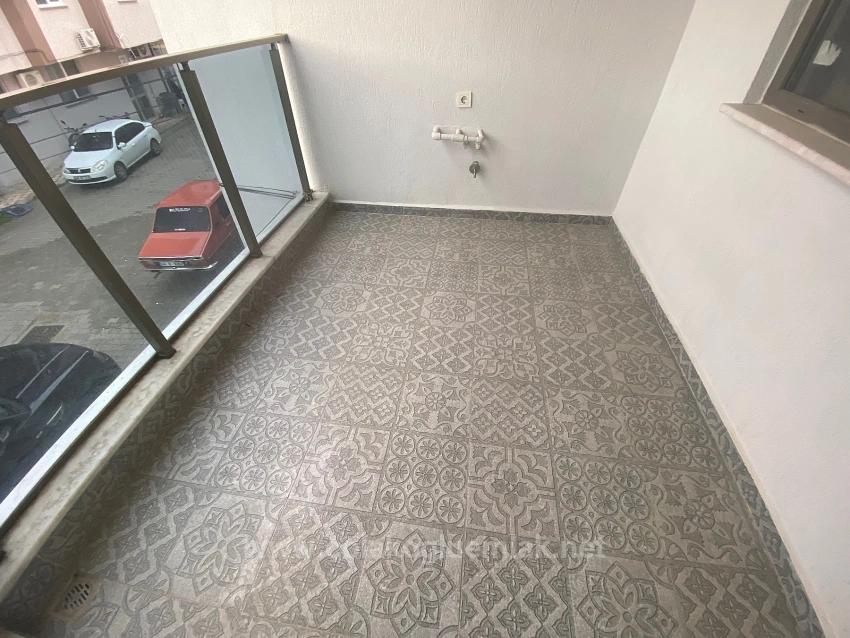 1+1 Apartment For Sale In Ortaca Center, 1St Floor Above A Shop