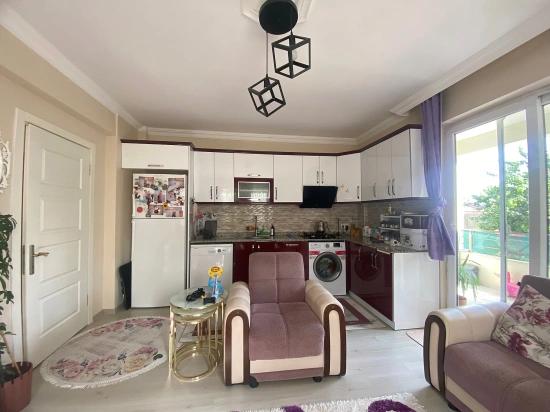 Köyceğiz Merkezde Satılık Bahçe Nizam 1+1 Geniş Yüksek Giriş Kat Daire